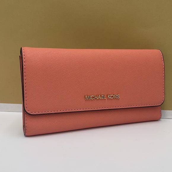 MICHAEL KORS JET SET TRAVEL LARGE TRIFOLD WALLET SHERBERT COLOR
NWT - Picture 11 of 16
